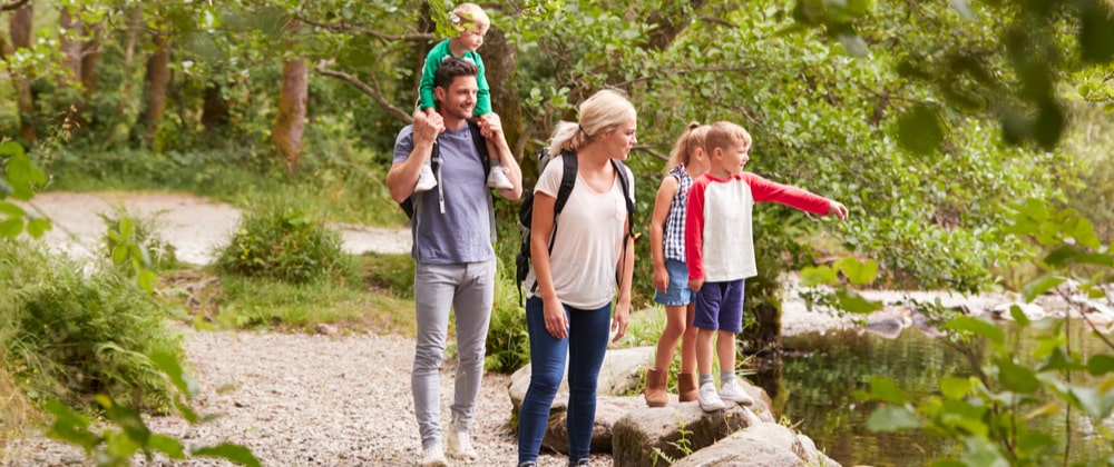 family walking in the lake distirct